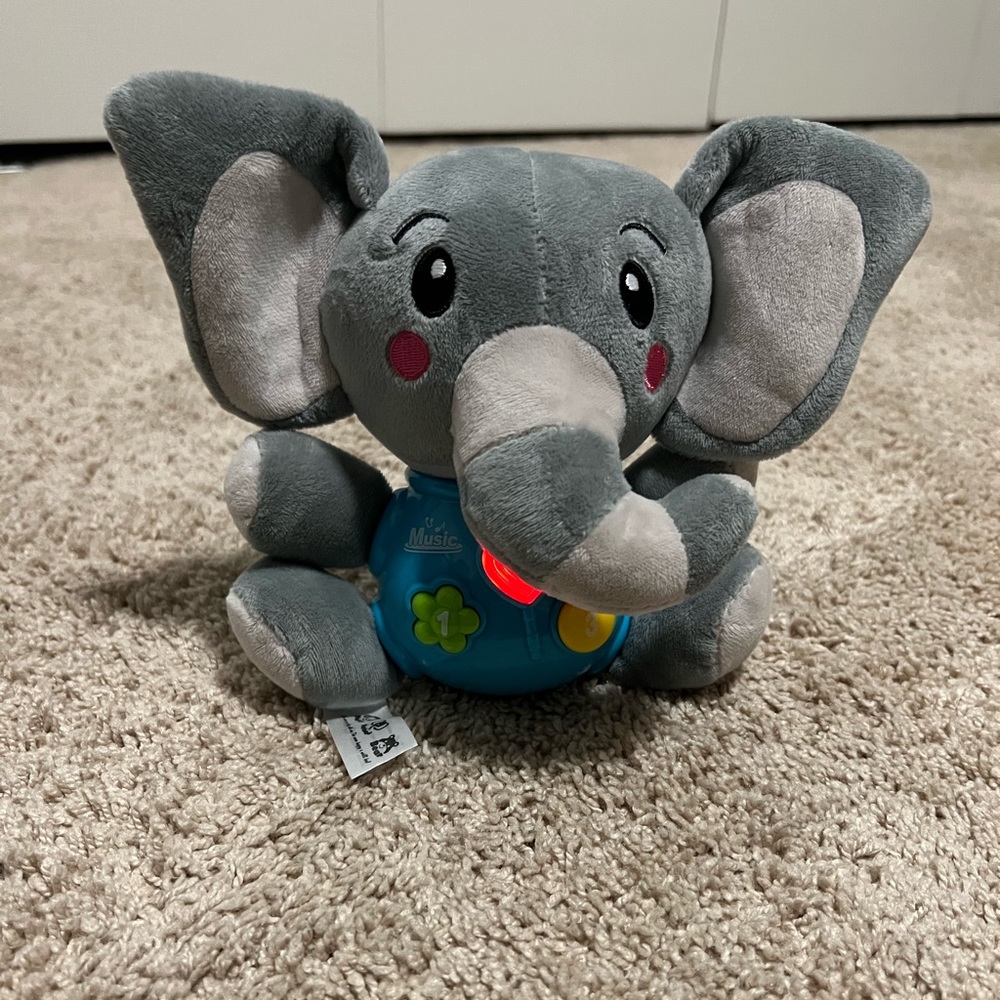 Plush elephant music toy